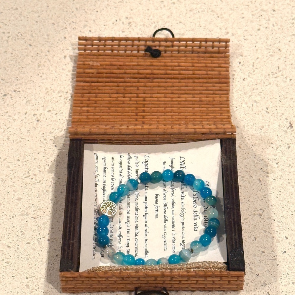 Blue Beaded Bracelet with Silver Charm